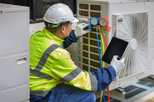 Professional Air Conditioning Repair technician working in Wolcottville, IN